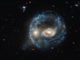  ادغام ۲ کهکشان در فاصله ۷۰۰ میلیون سال نوری از زمین 
